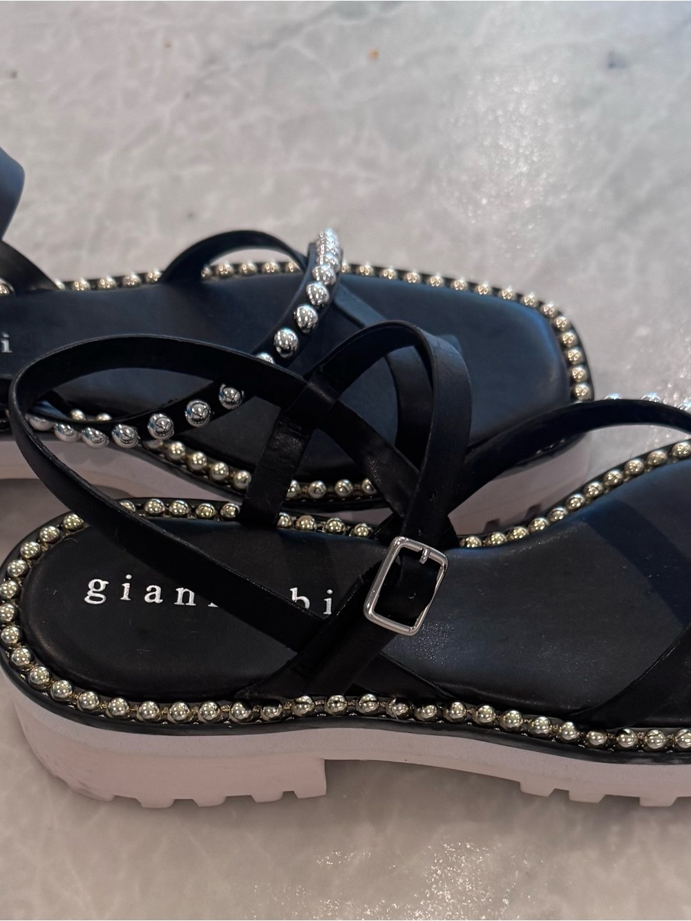 Gianni Bini Black Strappy Sandals with Silver Stud Trim. Fits true to size.